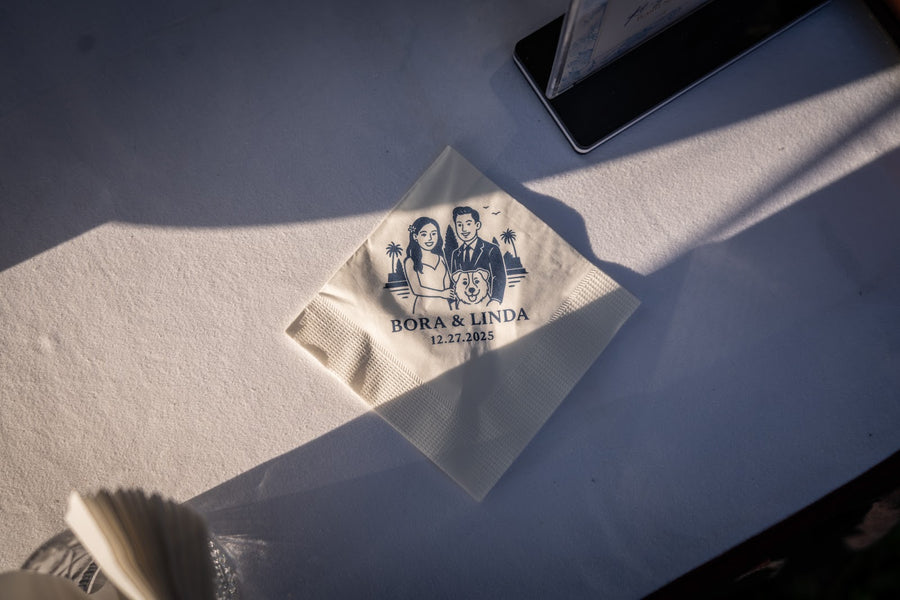 Napkin with printed design of a couple and text on a textured surface