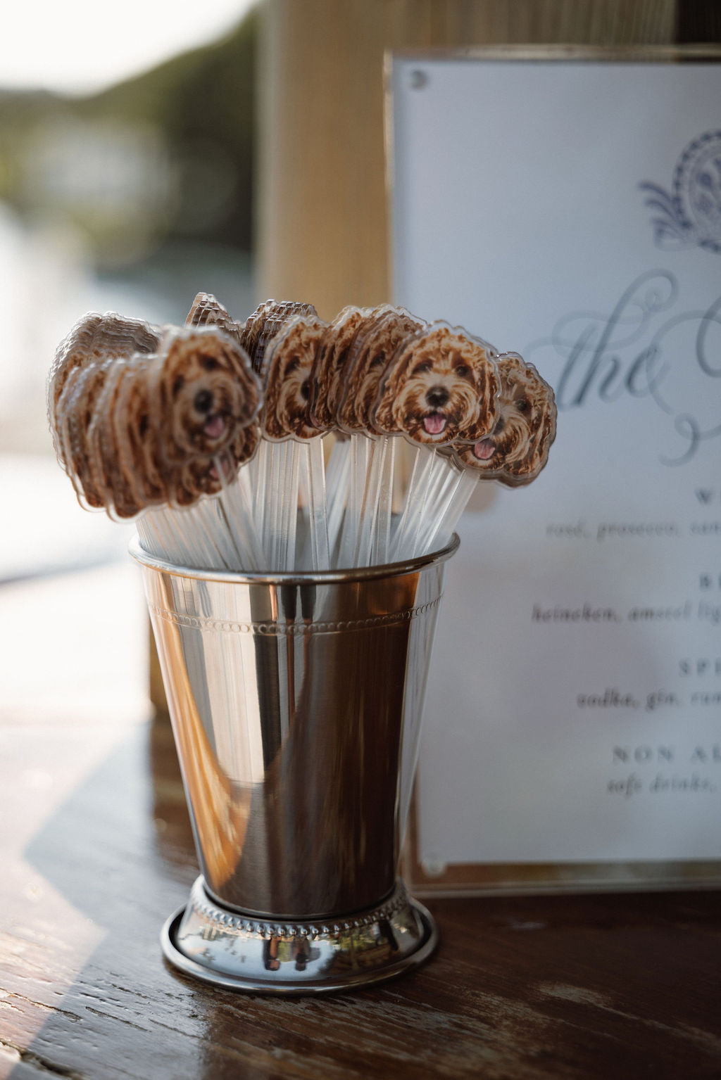 Dog head stirrers in a cup