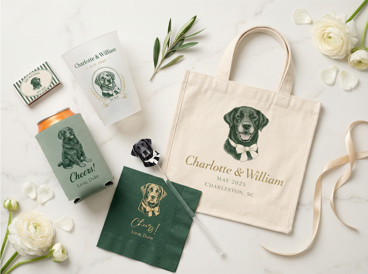 Wedding-themed products including a tote bag, can coolers, and napkins with dog illustrations on a marble surface.